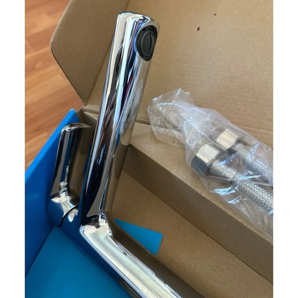 Aromo brand tall basin mixer tap in chrome finish.  It is a single-handle faucet